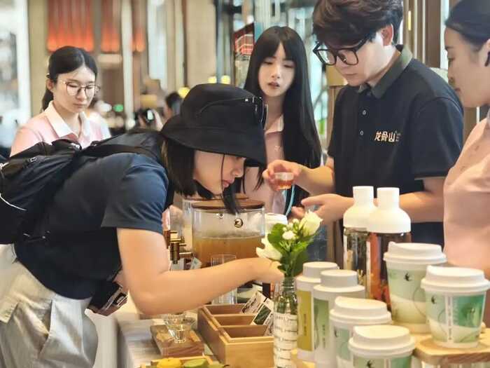 犍为两家茶企亮相国际绿茶大会