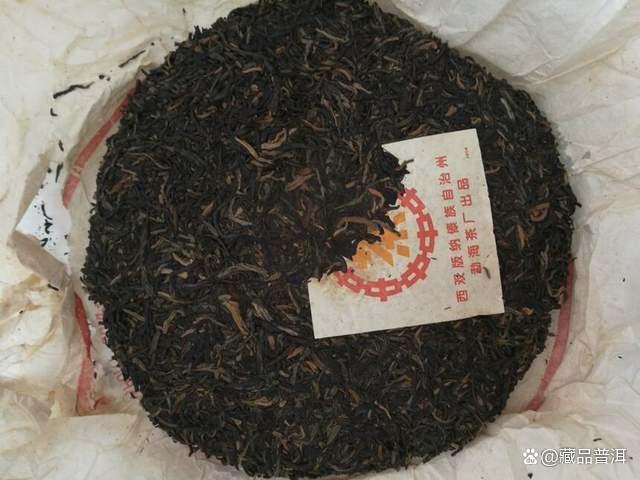 2000年橙中橙印青饼：勐海茶厂创新型花香茶，包装年份如何辨识？
